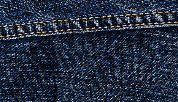 Close-up raw denim jeans